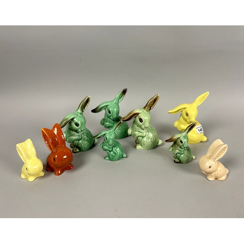 140 - A collection of nine Sylvac pottery bunny figures.