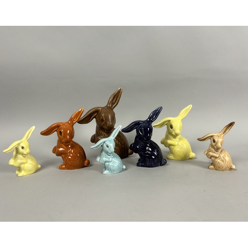 142 - A collection of seven Sylvac pottery bunny figures.