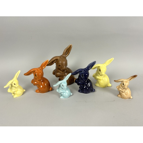 142 - A collection of seven Sylvac pottery bunny figures.