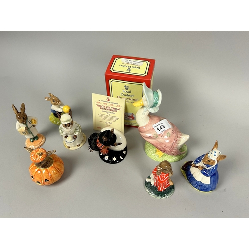 143 - A collection of eight Royal Doulton Bunnykins figurines. Including a boxed 'Trick or Treat' figurine... 