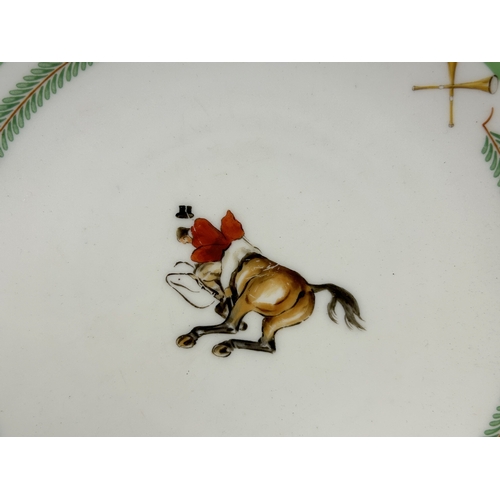 153 - A scarce Royal Worcester 'Huntsman' porcelain plate.Designed by H.R Millais.