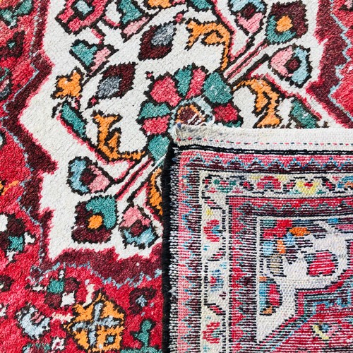 169 - Two Hall Carpets - One Burnt Orange Heriz Silk Road Style Rug and One Wool Hamadan Style Rug