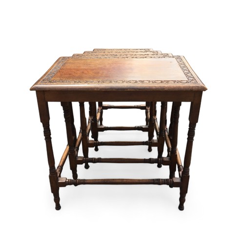 437 - Nest of 4 Anglo Indian 20th Century Tables. Having Foliate Carving design to the Borders.Height 57cm... 