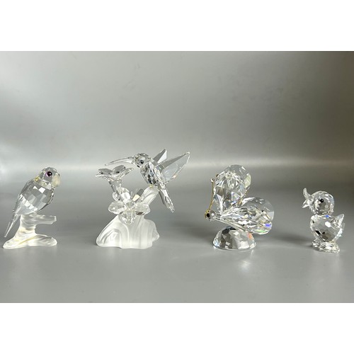 120 - Four boxed Swarovski silver crystal animals. Including Parrot, Hummingbird, Butterfly & Duckling... 