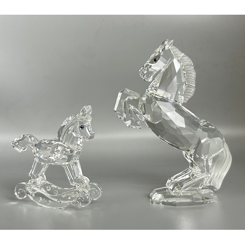 122 - Two boxed Swarovski silver crystal animals. Including Rearing horse & rocking horse. Also includ... 