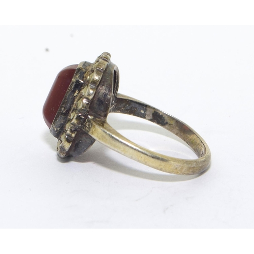 293 - 925 silver vintage Cornelian centre halo design rings size O