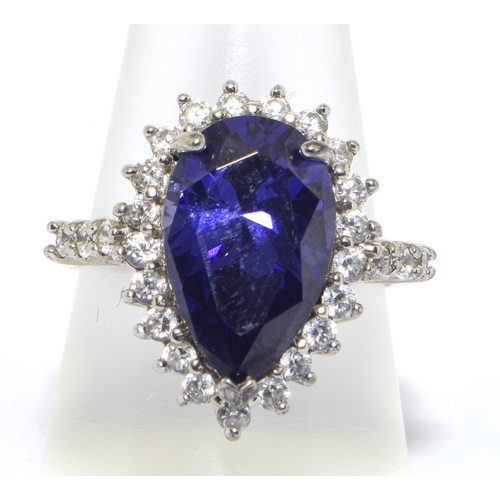 320 - 925 silver large pear shape statement ring in a halo design centre stone is multi faceted Amethyst s... 