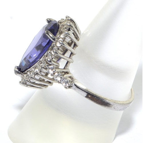 320 - 925 silver large pear shape statement ring in a halo design centre stone is multi faceted Amethyst s... 