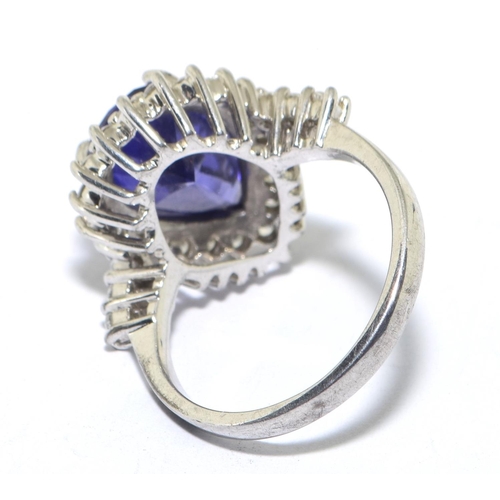 320 - 925 silver large pear shape statement ring in a halo design centre stone is multi faceted Amethyst s... 