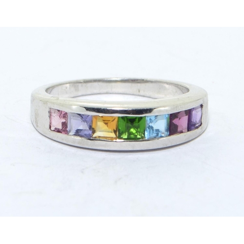 327 - 925 silver multi gem stone ring set in a chanel setting size N