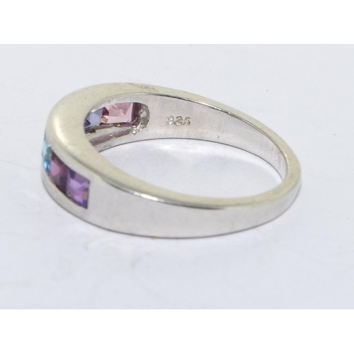 327 - 925 silver multi gem stone ring set in a chanel setting size N