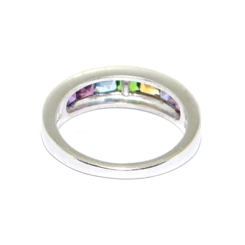 327 - 925 silver multi gem stone ring set in a chanel setting size N