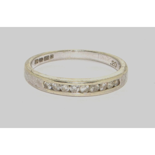 287 - A 9ct white gold Diamond 1/2 eternity ring with Chanel set diamonds Hall marked as 0.2ct Diamond in ... 