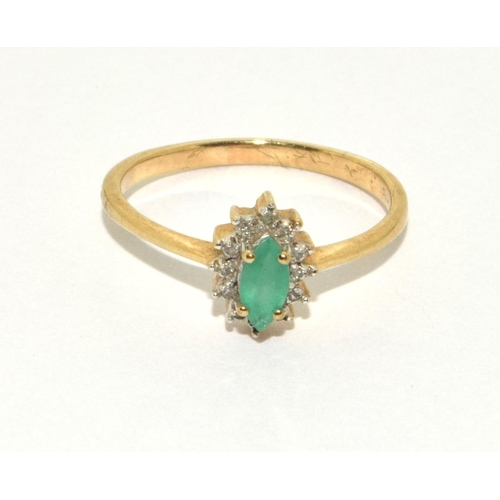 295 - 9ct gold ladies diamond and emerald cluster ring size N