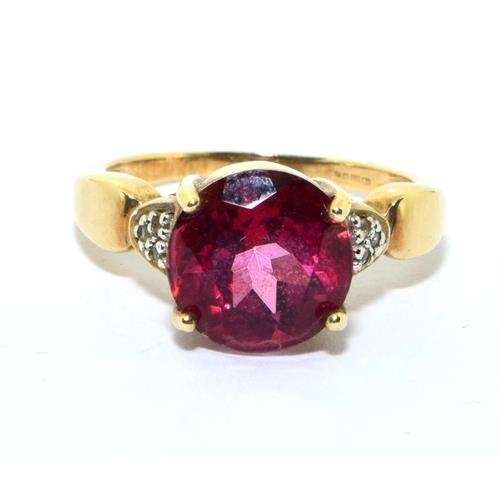 277 - 9ct gold ladies Rubellite and Diamond statement ring size O