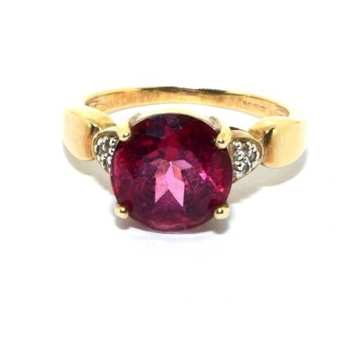 277 - 9ct gold ladies Rubellite and Diamond statement ring size O