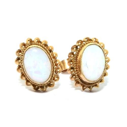 296 - 9ct gold Opal stud earrings