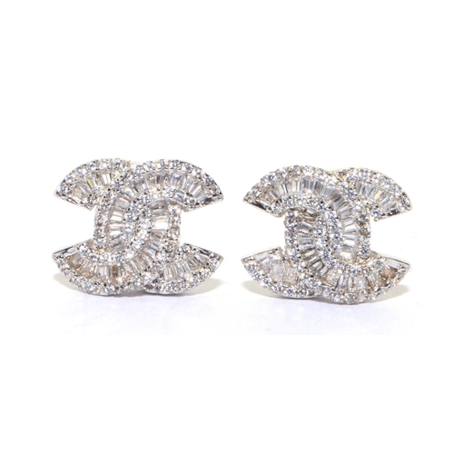 322 - Silver designer style stud earrings 