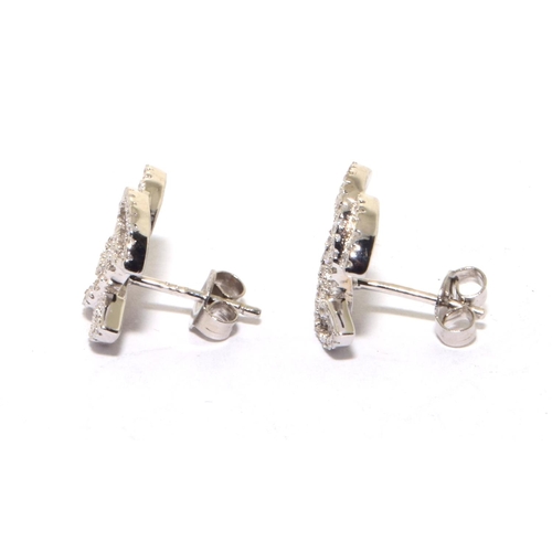 322 - Silver designer style stud earrings 