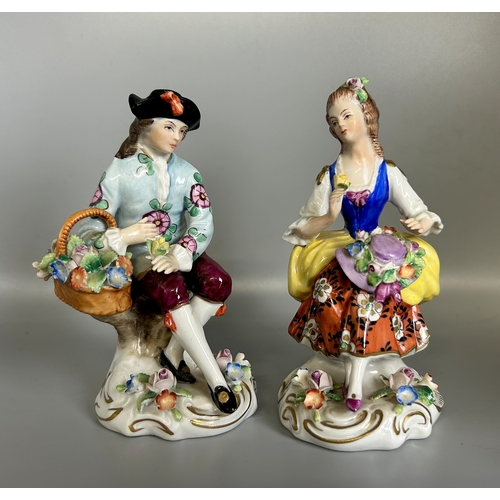 509 - A pair of Sitzendorf porcelain figures. Together with a pair of 19th German porcelain figures. Heigh... 