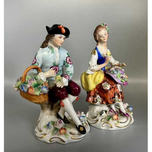 509 - A pair of Sitzendorf porcelain figures. Together with a pair of 19th German porcelain figures. Heigh... 