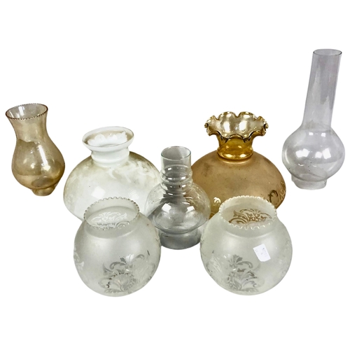 9 - Assortment of vintage glass chimneys and shades for oil lamps