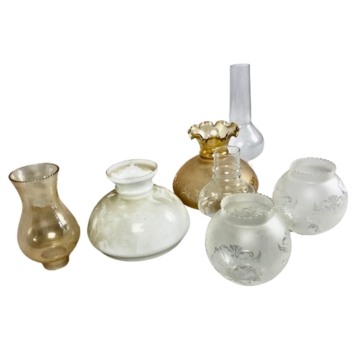 9 - Assortment of vintage glass chimneys and shades for oil lamps