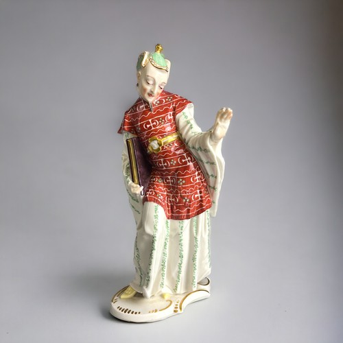 386 - After Franz Anton Bustelli porcelain figure.Nymphenburg porcelain, 20th Century.Chinese priest. Heig... 