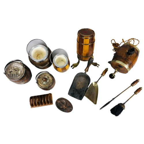 21 - Collection of Small coopered barrels in the form of tobacco jars, and a lamp together with fire iron... 