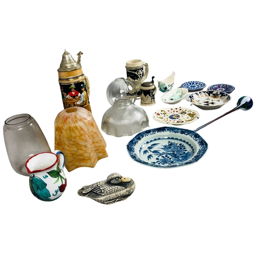 26 - Collection of retro glass lampshades together with studio pottery and and octagonal porcelain plate.