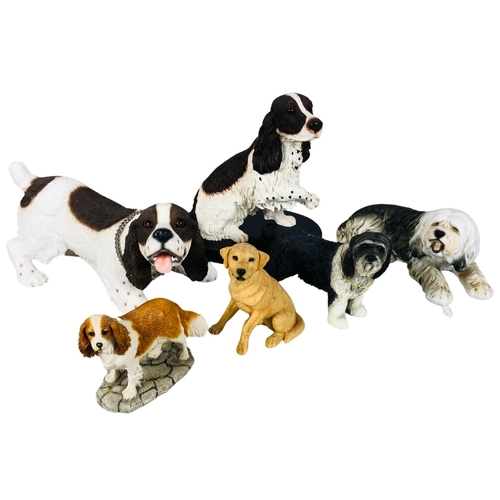 52 - Collection of dog figurines ceramic and resin