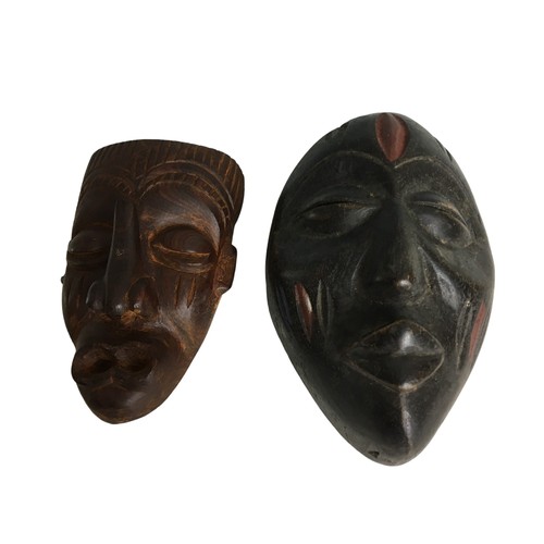 104 - Two African Tribal Masks Small. Wall hanging Souvenir Pieces, nicely carved.Each 15cm approximately ... 