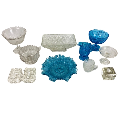 81 - Collection of glass to include three pieces of depression era blue glass and a pair of clear glass s... 