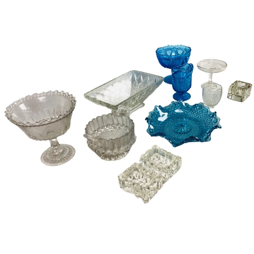 81 - Collection of glass to include three pieces of depression era blue glass and a pair of clear glass s... 