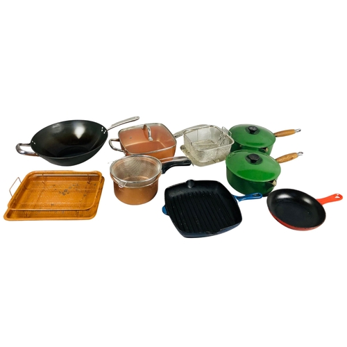 94 - Cooking items to include Cast Iron pans.