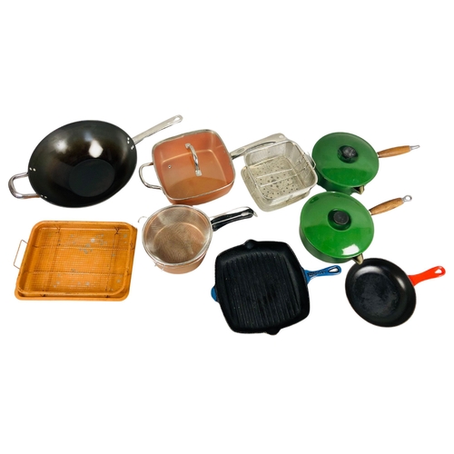 94 - Cooking items to include Cast Iron pans.