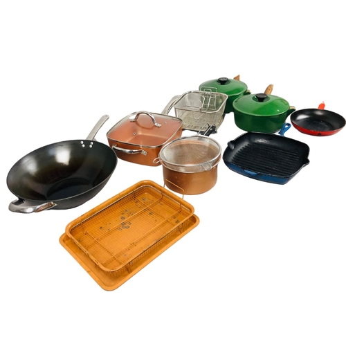 94 - Cooking items to include Cast Iron pans.