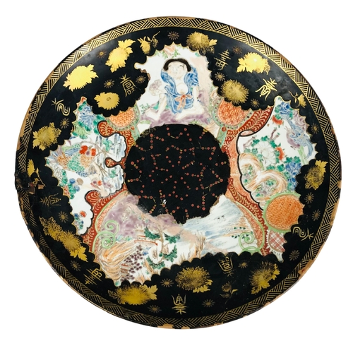 112 - Large Antique Chinese charger. Repaired with rivets. Part glazed and painted56cm diameter... 