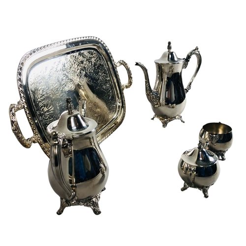 115 - Silver plate Tea set and matching Coffee pot together with an accompanying tray.