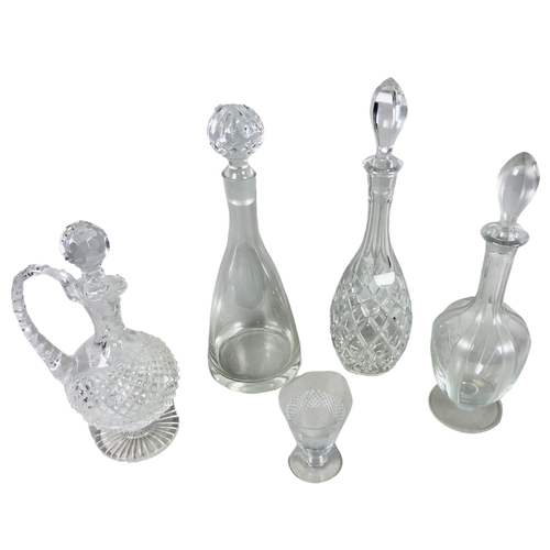 116 - A number of cut glass Decanters