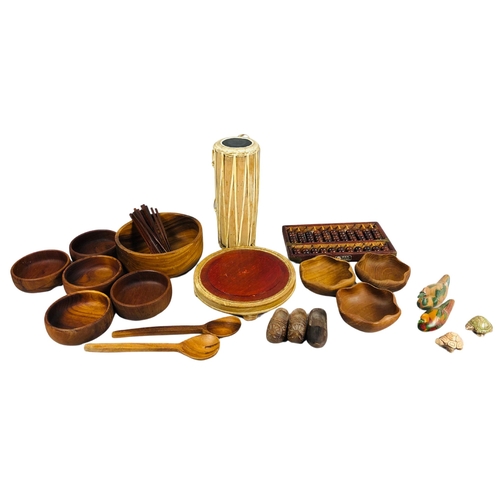 123 - Various wooden bowls and other items to include a velvet lined display stand.