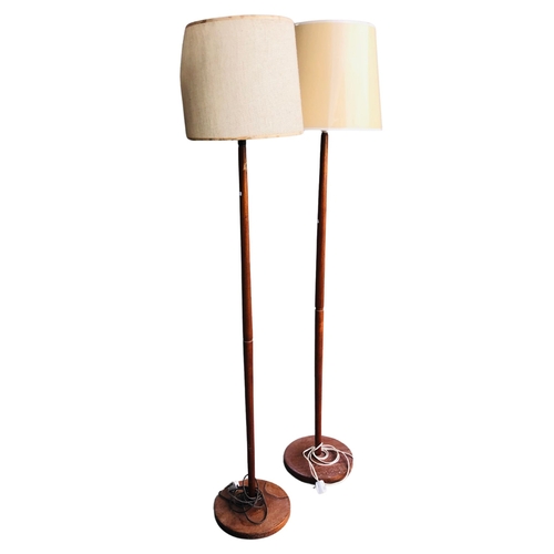 143 - Pair of wooden Standard Lamps. stamped Oscar Bruno 1981