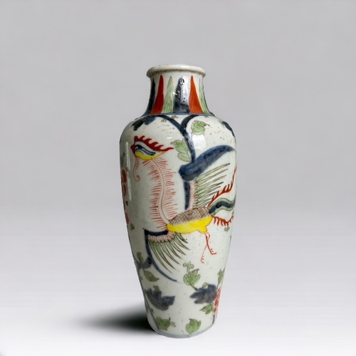 16 - A Chinese porcelain Wucai vase.Qing dynasty. Hand painted in Kangxi style, with a Phoenix amongst bl... 