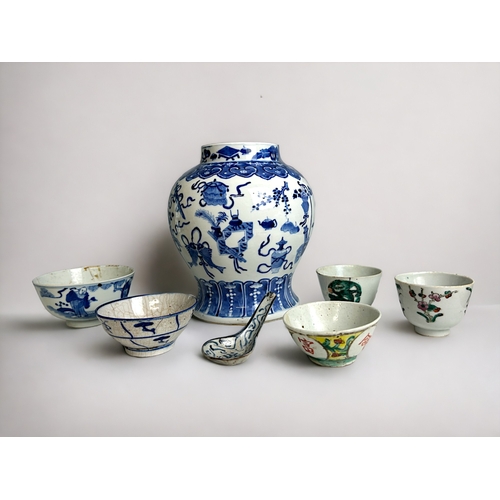 28 - A collection of Ming & Qing dynasty porcelain. Including blue & white baluster vase, depicti... 