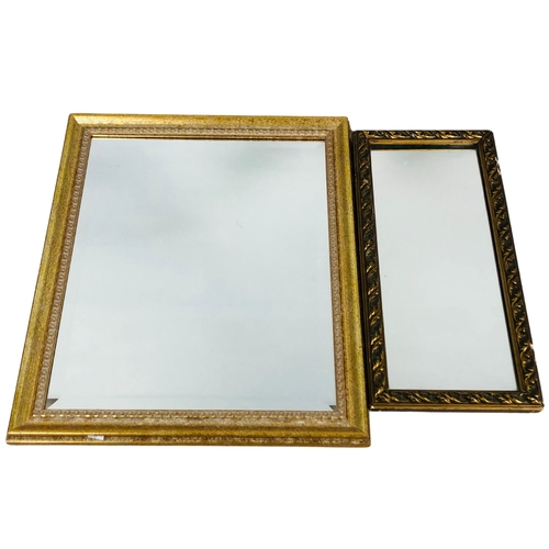 180 - 2 gilt framed Mirrors one with bevelled edge mirror plate.