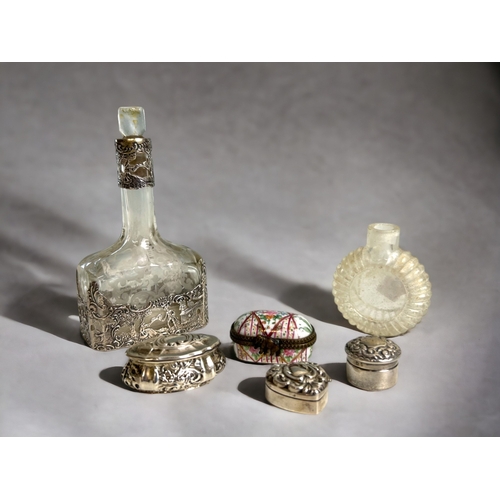 728 - A collection of antique silver pill boxes, decanter & glass perfume bottle.Including a German 93... 