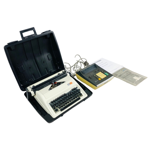 233 - Portable manual Typewriter and electric desk Calculator