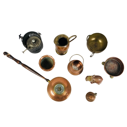 237 - Assortment of copper and brass items to include a copper tray with brass lion paw feet.