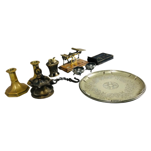 239 - Collection of Antique metal ware including a hanging bronze oil burner, brass dwarf candlesticks and... 