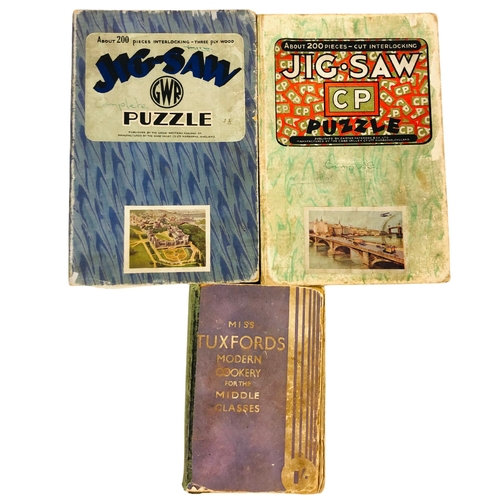 240 - 2 vintage wooden jigsaw puzzles and a cookery book.